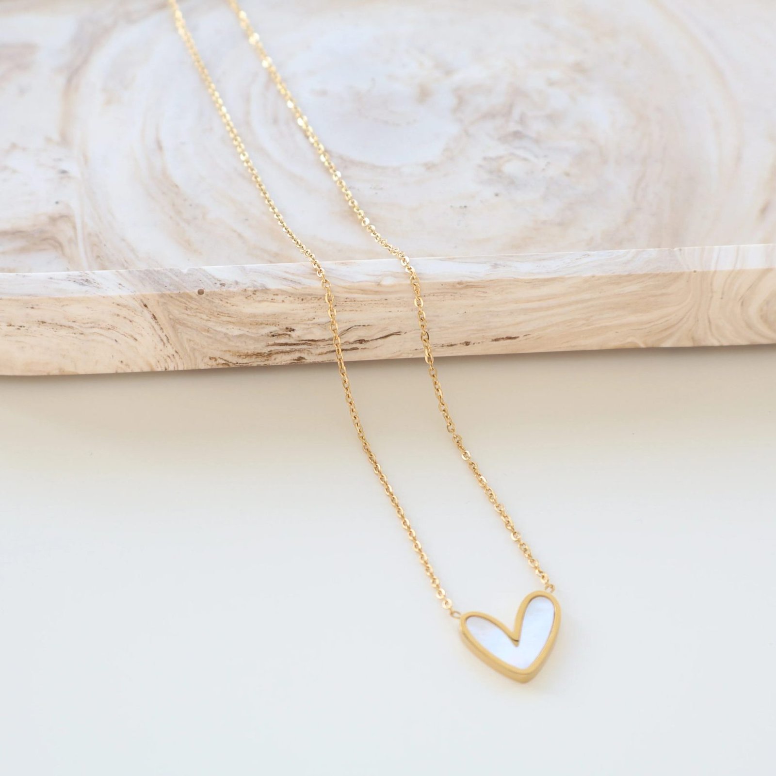 imgi_204_032B13B4-00F5-40BB-8BD5-9CB2D5D0B6B9 Enchanted Elegance white Heart Necklace - Image 1