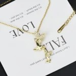 Golden Flutter Wings Pendant Necklace - Image 3