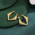 Asymmetric Fold Gold Hoops Earrings - Image 6