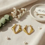 Asymmetric Fold Gold Hoops Earrings - Image 2