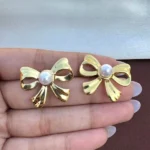 Pearl Bow Stud Earrings - Image 6