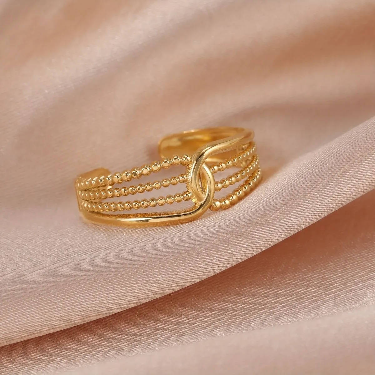 imgi_1_a8c3ee90daf14ef5271f54a0953bd336 Braided Layered Knot Row Ring - Image 1