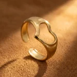 Gold-plated stainless steel fluid cutout heart adjustable ring