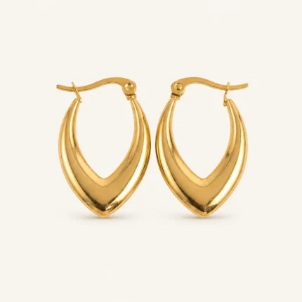 Pair of gold-plated stainless steel V-shaped hoop earrings with polished finish on a neutral background